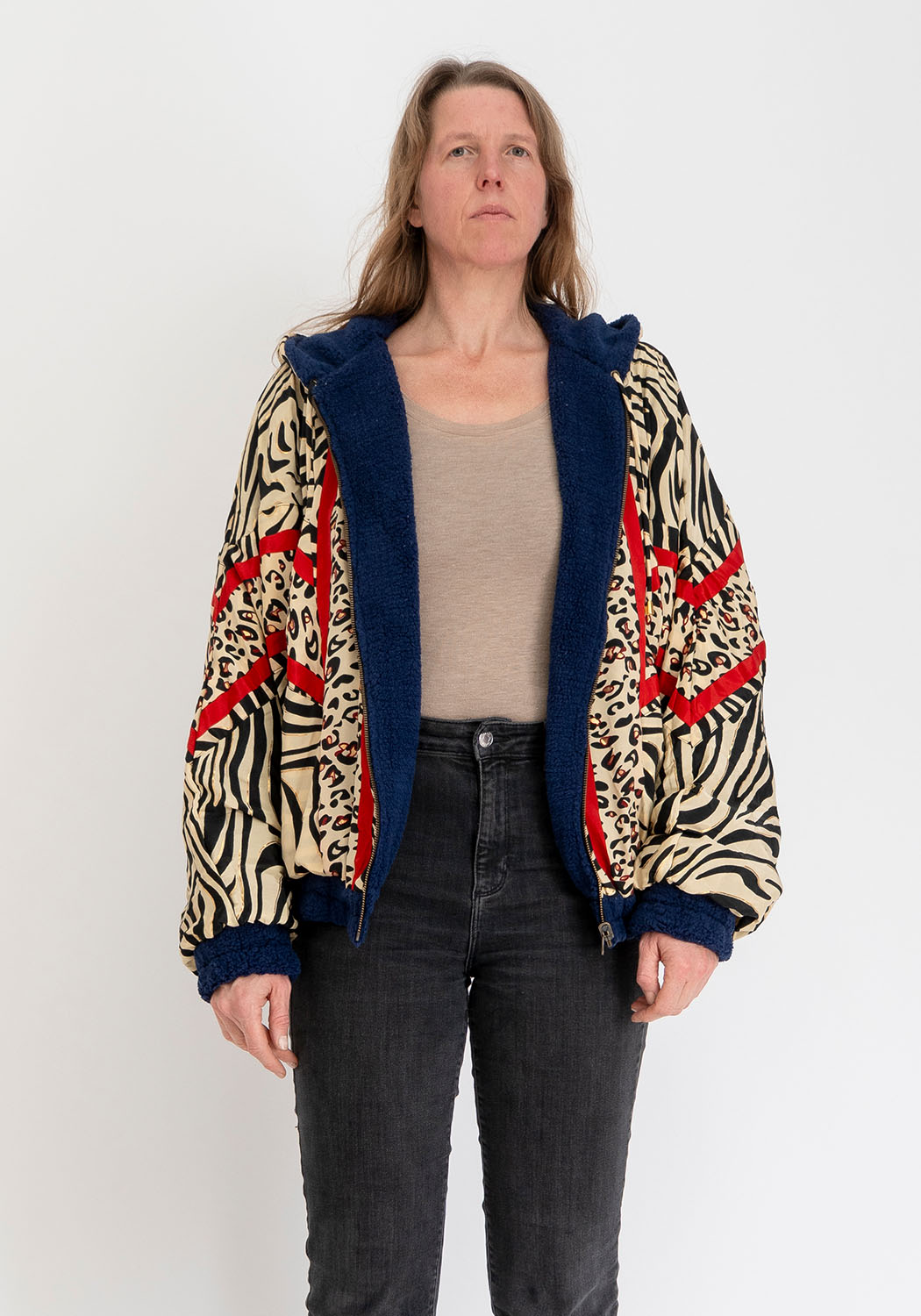 Dunkelblaue Teddyjacke mit Kapuze, wendbar Zebra Print